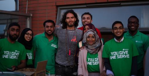 Russell Brand joins Muslim Aid to feed the homeless at Booth House